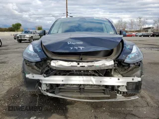 2023 Tesla Model Y Long Range with VIN 7SAYGDEE8PF877926, listed as a Copart auction lot 44342645 with 41,408 mi miles and Salvage Title. Bid and sale history available at DreamBid. Image 5.