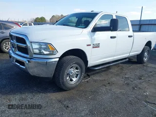2013 Ram 2500 Tradesman z VIN 3C6TR5HT9DG575642, wystawiony jako IAAI lot #41557823 z przebiegiem 223 859 mil mil oraz . Historia ofert i sprzedaży dostępna na DreamBid. Obrazek 2.