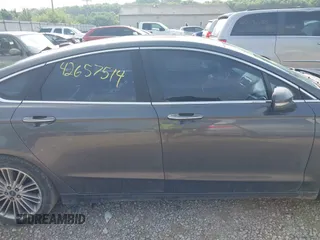 2016 Ford Fusion SE with VIN 3FA6P0T98GR155623, listed as a IAAI auction lot 42657514 with 171,518 mi miles and . Bid and sale history available at DreamBid. Image 14.