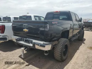 2014 Chevrolet Silverado 3500HD SRW LTZ z VIN 1GC4K1E88EF174192, wystawiony jako Copart lot #57530285 z przebiegiem 71 457 mil mil oraz Tytuł czysty. Historia ofert i sprzedaży dostępna na DreamBid. Obrazek 3.