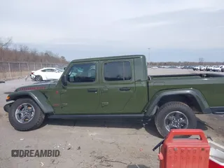 2023 Jeep Gladiator Rubicon with VIN 1C6JJTBGXPL586154, listed as a IAAI auction lot 41370352 with 11,207 mi miles and . Bid and sale history available at DreamBid. Image 14.
