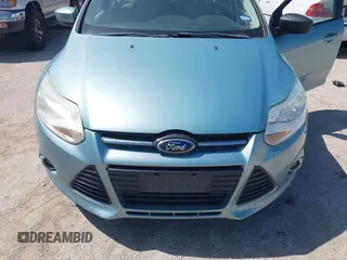 2012 Ford Focus SE z VIN 1FAHP3F22CL352952, wystawiony jako IAAI lot #42722671 z przebiegiem 126 923 mil mil oraz . Historia ofert i sprzedaży dostępna na DreamBid. Obrazek 6.