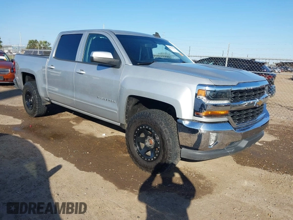 2018 Chevrolet Silverado 1500 LT with VIN 3GCPCREC9JG574686, listed as a IAAI auction lot 41676124 with 74,239 mi miles and . Bid and sale history available at DreamBid. Image 1.