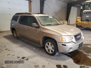 2004 GMC Envoy SLT with VIN 1GKET16S546158305, listed as a Copart auction lot 72409094 with 171,302 mi miles and Salvage Title. Bid and sale history available at DreamBid. Image 4.