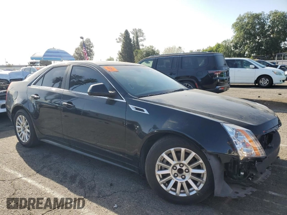 2012 Cadillac CTS Luxury with VIN 1G6DF5E56C0144953, listed as a Copart auction lot 51704895 with 123,099 mi miles and Salvage Title. Bid and sale history available at DreamBid. Image 4.