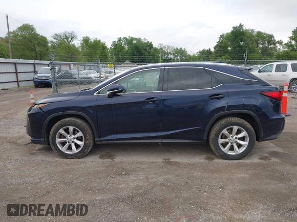 2016 Lexus RX 350 with VIN 2T2BZMCA1GC012079, listed as a IAAI auction lot 42265304 with 124,861 mi miles and . Bid and sale history available at DreamBid. Image 14.