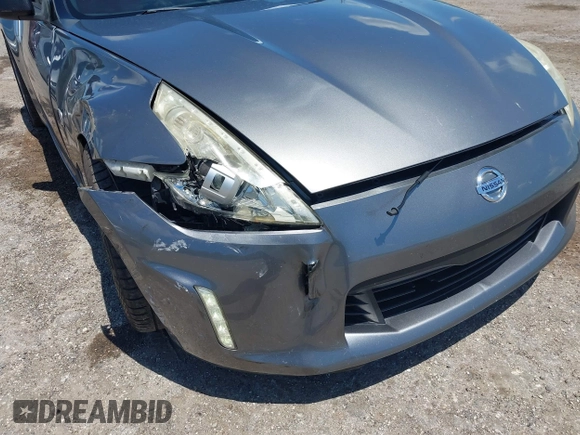 2013 Nissan 370Z Touring z VIN JN1AZ4EH2DM384011, wystawiony jako IAAI lot #42274166 z przebiegiem 87 499 mil mil oraz . Historia ofert i sprzedaży dostępna na DreamBid. Obrazek 6.
