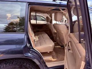 2002 Toyota Land Cruiser z VIN JTEHT05J622022972, wystawiony jako Copart lot #59201475 z przebiegiem 299 548 mil mil oraz Czysty tytuł • Clean title. Historia ofert i sprzedaży dostępna na DreamBid. Obrazek 6.