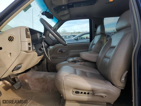 1999 Chevrolet Tahoe with VIN 3GNEK18R4XG124715, listed as a Copart auction lot 84744304 with 276,891 mi miles and Clean Title. Bid and sale history available at carsss.com. Image 7.