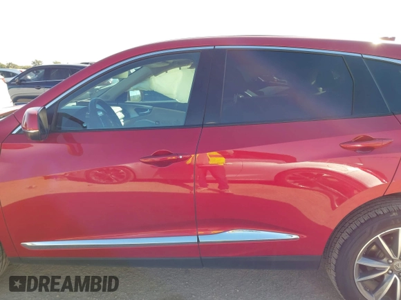 2019 Acura RDX Technology with VIN 5J8TC2H59KL001912, listed as a IAAI auction lot 40554335 with 45,986 mi miles and . Bid and sale history available at DreamBid. Image 14.