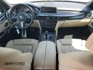 2016 BMW X5 xDrive50i z VIN 5UXKR6C50G0J81828, wystawiony jako Copart lot #52572315 z przebiegiem 91 737 mil mil oraz Szkoda całkowita • Salvage title. Historia ofert i sprzedaży dostępna na DreamBid. Obrazek 8.