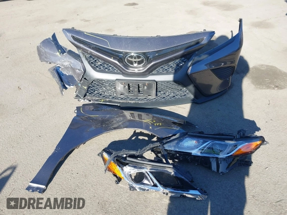 2018 Toyota Camry LE z VIN 4T1B11HK0JU546451, wystawiony jako IAAI lot #41054832 z przebiegiem 35 660 mil mil oraz . Historia ofert i sprzedaży dostępna na DreamBid. Obrazek 12.