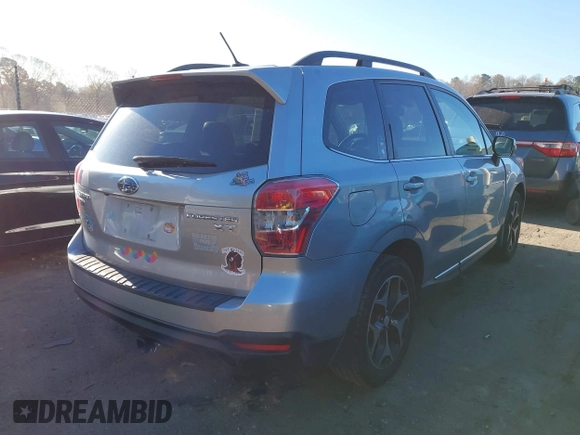 2015 Subaru Forester 2.0XT Touring with VIN JF2SJGWC7FH511989, listed as a IAAI auction lot 41888571 with 135,501 mi miles. Bid and sale history available at carsss.com. Image 4.