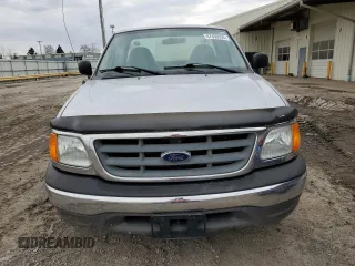 2004 Ford F-150 XL z VIN 2FTRF18274CA75519, wystawiony jako Copart lot #47450395 z przebiegiem 129 099 mil mil oraz Szkoda całkowita • Salvage title. Historia ofert i sprzedaży dostępna na DreamBid. Obrazek 5.