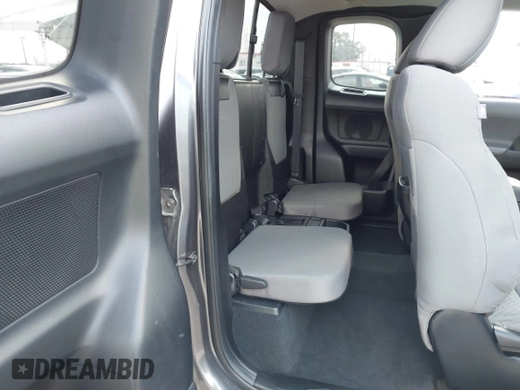 2022 Toyota Tacoma SR with VIN 3TYSX5EN8NT016817, listed as a IAAI auction lot 42140136 with 52,825 mi miles and . Bid and sale history available at DreamBid. Image 8.