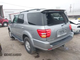 2003 Toyota Sequoia SR5 with VIN 5TDZT34A03S200882, listed as a IAAI auction lot 41664909 with 221,882 mi miles. Bid and sale history available at carsss.com. Image 3.