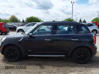 2015 MINI Countryman S z VIN WMWZC5C51FWM19433, wystawiony jako IAAI lot #42365991 z przebiegiem 158 205 mil mil oraz . Historia ofert i sprzedaży dostępna na DreamBid. Obrazek 14.