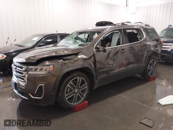 2020 GMC Acadia SLT with VIN 1GKKNULS8LZ154037, listed as a IAAI auction lot 42061743 with 54,657 mi miles and . Bid and sale history available at DreamBid. Image 2.