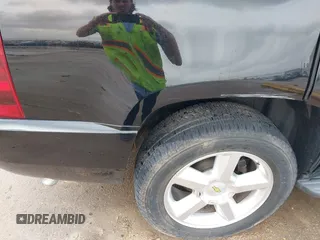 2014 Chevrolet Tahoe LTZ z VIN 1GNSCCE04ER141920, wystawiony jako IAAI lot #41484239 z przebiegiem 98 855 mil mil oraz . Historia ofert i sprzedaży dostępna na DreamBid. Obrazek 16.