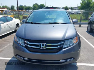 2014 Honda Odyssey EX-L with VIN 5FNRL5H63EB073585, listed as a IAAI auction lot 42673004 with 119,971 mi miles and . Bid and sale history available at DreamBid. Image 12.
