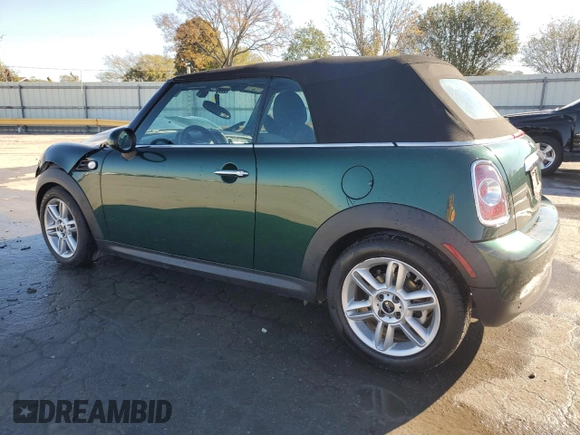 2015 MINI Convertible with VIN WMWZN3C53FT862148, listed as a Copart auction lot 76911714 with 56,065 mi miles and Salvage title. Bid and sale history available at DreamBid. Image 2.