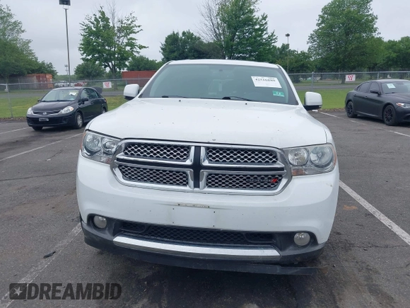 2013 Dodge Durango Crew with VIN 1C4RDJDG4DC518156, listed as a IAAI auction lot 42516880 with 162,402 mi miles and . Bid and sale history available at DreamBid. Image 12.