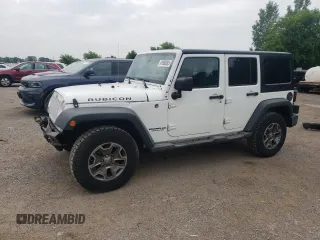 2016 Jeep Wrangler Unlimited Rubicon with VIN 1C4BJWFG6GL327489, listed as a Copart auction lot 61980385 with 114,834 mi miles and Salvage title. Bid and sale history available at DreamBid. Image 1.