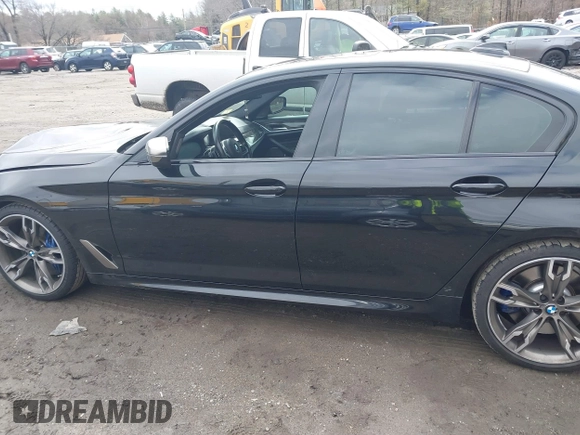 2020 BMW 5 Series M550i xDrive z VIN WBAJS7C09LCD45078, wystawiony jako IAAI lot #41850274 z przebiegiem 75 613 mil mil oraz . Historia ofert i sprzedaży dostępna na DreamBid. Obrazek 14.