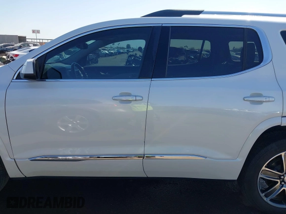 2019 GMC Acadia Denali with VIN 1GKKNPLS9KZ166469, listed as a IAAI auction lot 41857034 with 53,721 mi miles and . Bid and sale history available at carsss.com. Image 14.