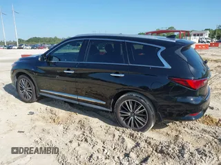 2020 Infiniti QX60 Pure with VIN 5N1DL0MN4LC539573, listed as a IAAI auction lot 42010032 with 104,507 mi miles and . Bid and sale history available at DreamBid. Image 14.