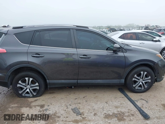 2017 Toyota RAV4 LE z VIN 2T3BFREV8HW667907, wystawiony jako IAAI lot #42130136 z przebiegiem 129 831 mil mil oraz . Historia ofert i sprzedaży dostępna na DreamBid. Obrazek 13.