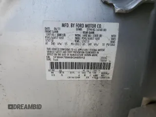 2011 Ford Explorer z VIN 1FMHK7B86BGA85912, wystawiony jako Copart lot #53089595 z przebiegiem 213 617 mil mil oraz Szkoda całkowita • Salvage title. Historia ofert i sprzedaży dostępna na DreamBid. Obrazek 13.