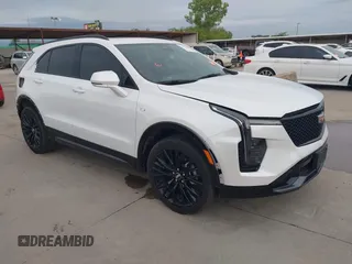 2024 Cadillac XT4 FWD Sport with VIN 1GYFZER42RF246488, listed as a IAAI auction lot 42029551 with 6,476 mi miles and . Bid and sale history available at DreamBid. Image 1.