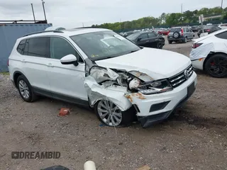 2018 Volkswagen Tiguan SEL z VIN 3VV2B7AX8JM102377, wystawiony jako IAAI lot #42246183 z przebiegiem 77 349 mil mil oraz . Historia ofert i sprzedaży dostępna na DreamBid. Obrazek 1.