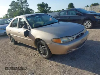 1999 Ford Escort SE with VIN 1FAFP13P5XW268897, listed as a IAAI auction lot 42844258 with 169,050 mi miles and . Bid and sale history available at DreamBid. Image 1.