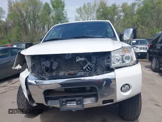 2005 Nissan Titan LE with VIN 1N6AA07BX5N525048, listed as a IAAI auction lot 41984150 with 242,321 mi miles. Bid and sale history available at carsss.com. Image 13.