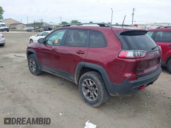 2020 Jeep Cherokee Trailhawk z VIN 1C4PJMBX8LD619813, wystawiony jako IAAI lot #42366066 z przebiegiem 69 811 mil mil oraz . Historia ofert i sprzedaży dostępna na DreamBid. Obrazek 3.