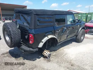 2021 Ford Bronco с VIN 1FMDE5BH2MLB03794, выставлен на аукционе IAAI как лот 42180534 с пробегом 59 807 миль миль и . История ставок и продаж доступна на DreamBid. Изображение 4.