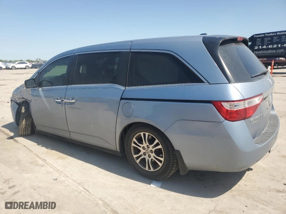 2013 Honda Odyssey EX-L with VIN 5FNRL5H63DB012106, listed as a Copart auction lot 52710755 with 69,674 mi miles and Salvage Title. Bid and sale history available at carsss.com. Image 2.