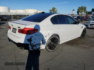 2020 BMW M5 Competition z VIN WBSJF0C02LCE07069, wystawiony jako Copart lot #66175502 z przebiegiem 28 945 mil mil oraz . Historia ofert i sprzedaży dostępna na DreamBid. Obrazek 4.