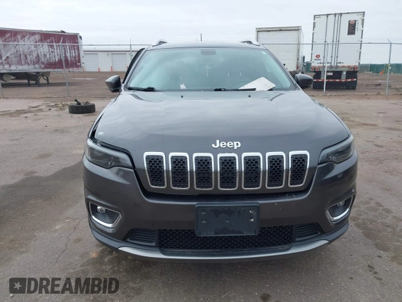 2020 Jeep Cherokee Limited with VIN 1C4PJMDX4LD589884, listed as a IAAI auction lot 41917930 with 57,703 mi miles and . Bid and sale history available at DreamBid. Image 12.