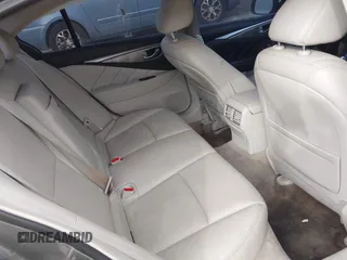 2015 Infiniti Q50 Premium with VIN JN1BV7AP5FM336231, listed as a IAAI auction lot 41654477 with 119,535 mi miles. Bid and sale history available at carsss.com. Image 8.