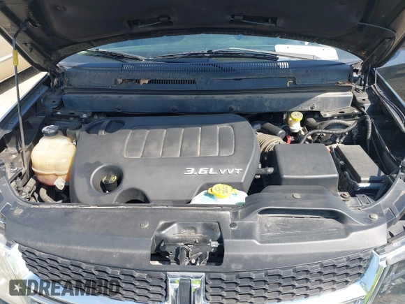 2015 Dodge Journey Crossroad with VIN 3C4PDDGG8FT633483, listed as a IAAI auction lot 42132925 with 138,235 mi miles and . Bid and sale history available at DreamBid. Image 10.
