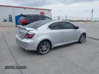2009 Scion tC with VIN JTKDE167190282930, listed as a IAAI auction lot 42034538 with 198,964 mi miles. Bid and sale history available at carsss.com. Image 4.