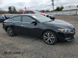 2017 Nissan Maxima SV with VIN 1N4AA6AP4HC414771, listed as a Copart auction lot 51579065 with 218,926 mi miles and Salvage Title. Bid and sale history available at DreamBid. Image 4.