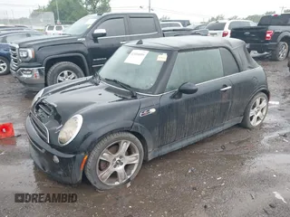 2006 MINI Convertible S with VIN WMWRH33516TF86823, listed as a IAAI auction lot 42184059 with Not Provided miles and . Bid and sale history available at DreamBid. Image 2.