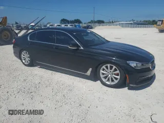 2019 BMW 7 Series 740i с VIN WBA7E2C50KB216552, выставлен на аукционе Copart как лот 56991985 с пробегом 121 140 миль миль и Чистый • Clean title. История ставок и продаж доступна на DreamBid. Изображение 4.