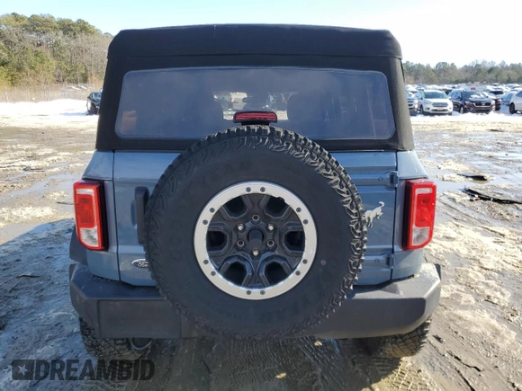 2023 Ford Bronco with VIN 1FMEE5DP0PLB17111, listed as a Copart auction lot 86588374 with 26,093 mi miles and Salvage Title. Bid and sale history available at DreamBid. Image 6.