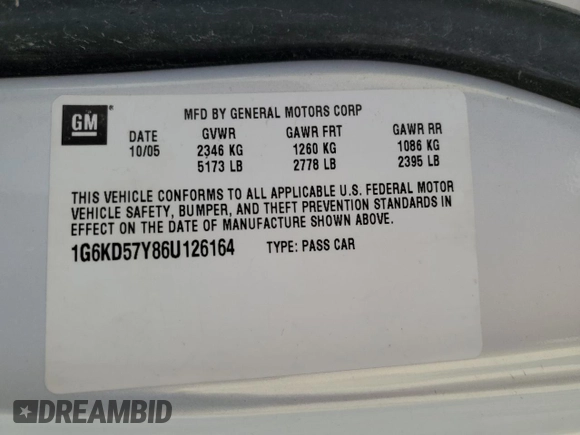 2006 Cadillac DTS 1SB z VIN 1G6KD57Y86U126164, wystawiony jako Copart lot #52686965 z przebiegiem 153 426 mil mil oraz Szkoda całkowita • Salvage title. Historia ofert i sprzedaży dostępna na DreamBid. Obrazek 12.