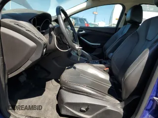 2013 Ford Focus SE with VIN 1FADP3F29DL352186, listed as a Copart auction lot 64972835 with 74,409 mi miles and Clean title. Bid and sale history available at DreamBid. Image 7.